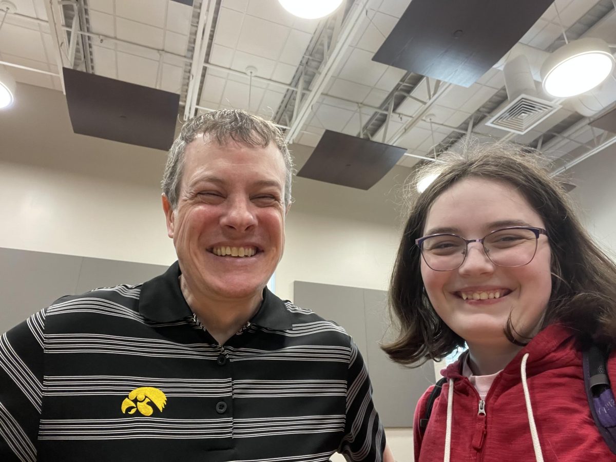 Melody Ross and Mr.Walker taking a selfie.