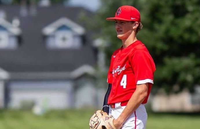 Coden Kurtz '28 at a baseball game preparing during warmups. 