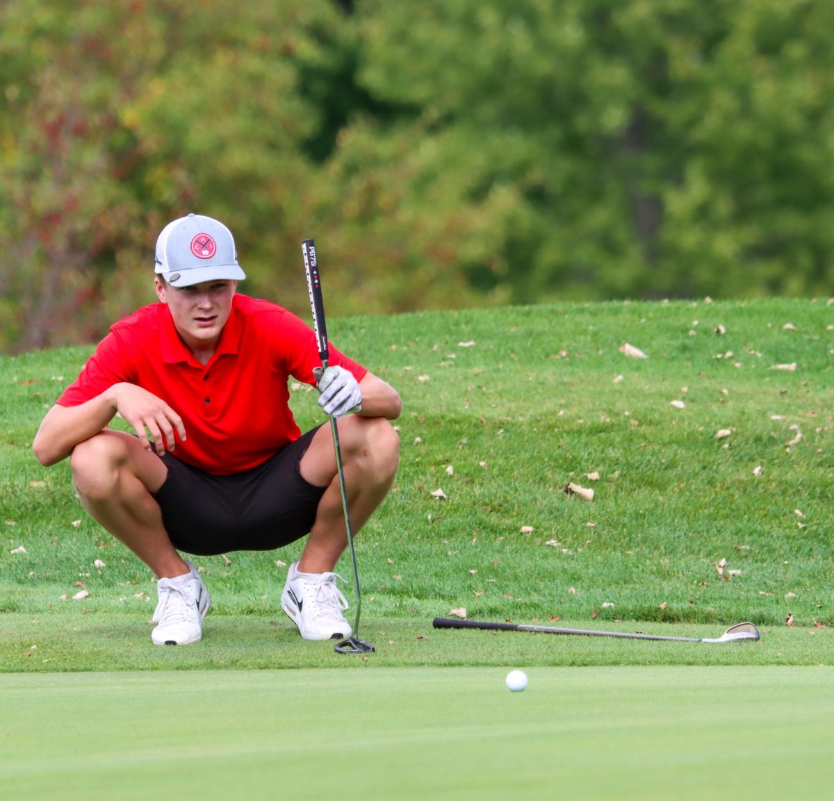 Joseph Hayek '27 Reading his putt for par on 11th green at Pleasant Valley Golf Course