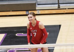 Lila Howe '25 is all smiles before matchup at a tournament hosted by Johnston.

Photo Courtesy of Lila Howe