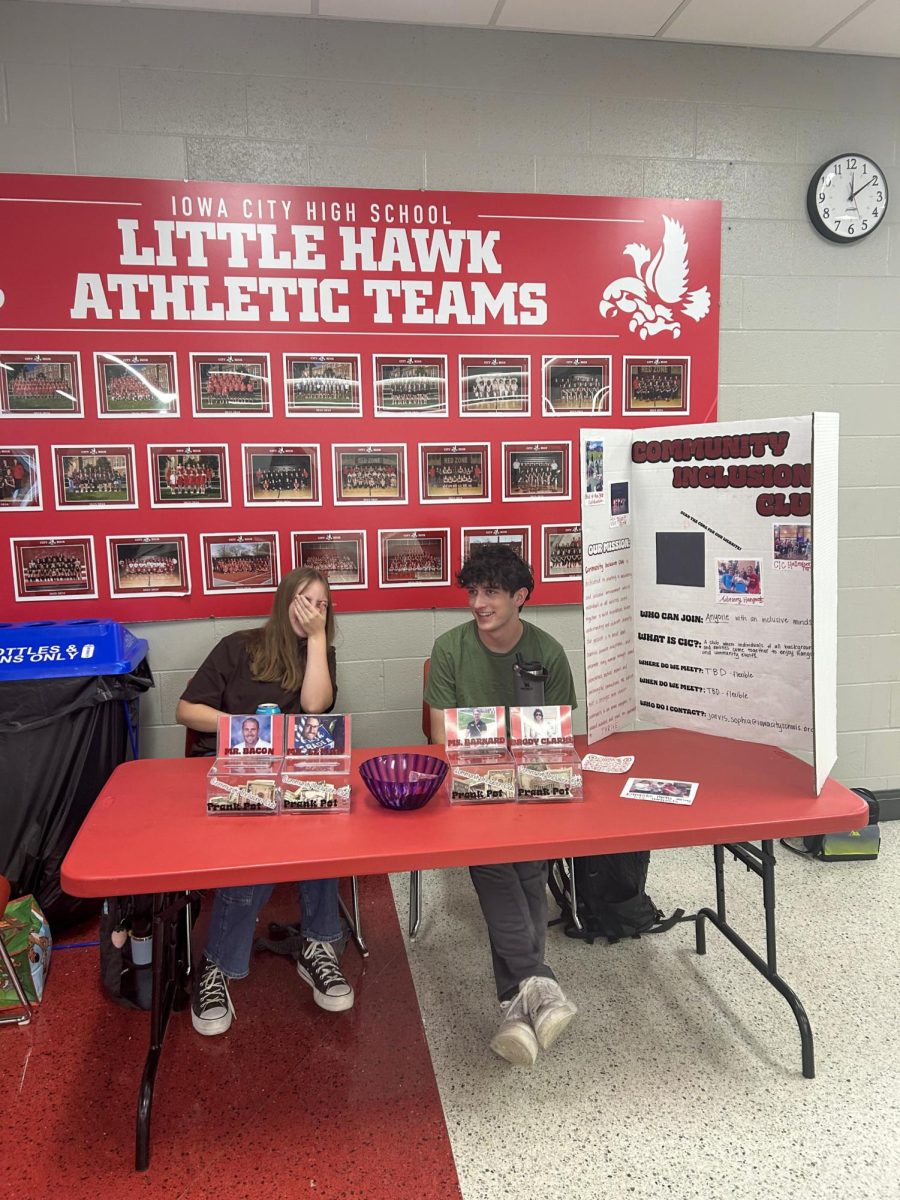 Thalia Svec '25 and Eli Foster '25 hold the fundraiser during lunch