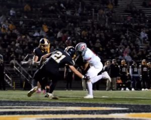 Miles Parlet runs the ball into Bettendorf defenders to get into the endzone in last year's week 9 game. 