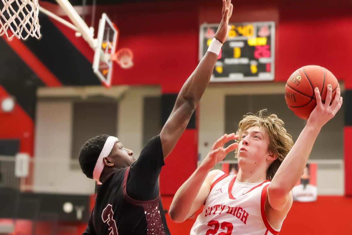 Jaxton Schroeder hooks his shot over a defender for the score. Schroeder averages 11.8 points per game in his 8 games he's played and started in.