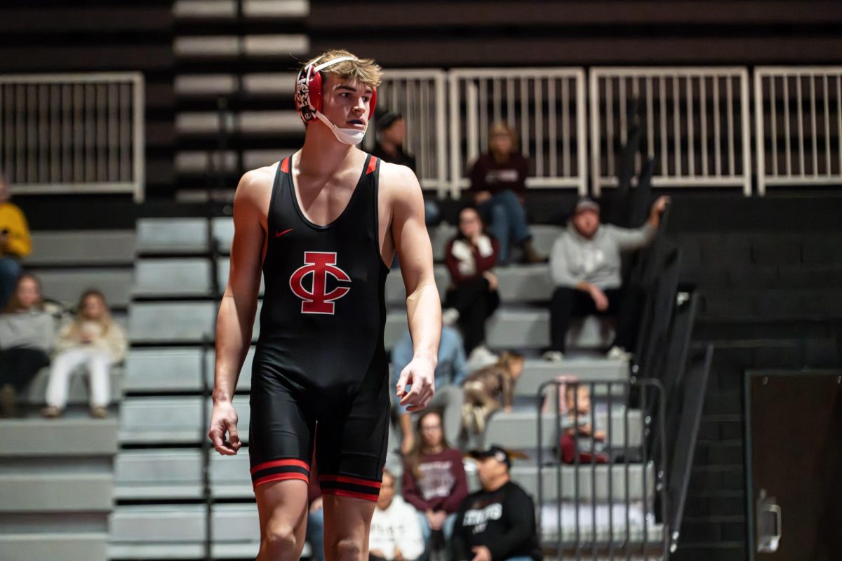 Blaine Heick '26 prepares for his match against Waterloo West. Heick went on to win his match.