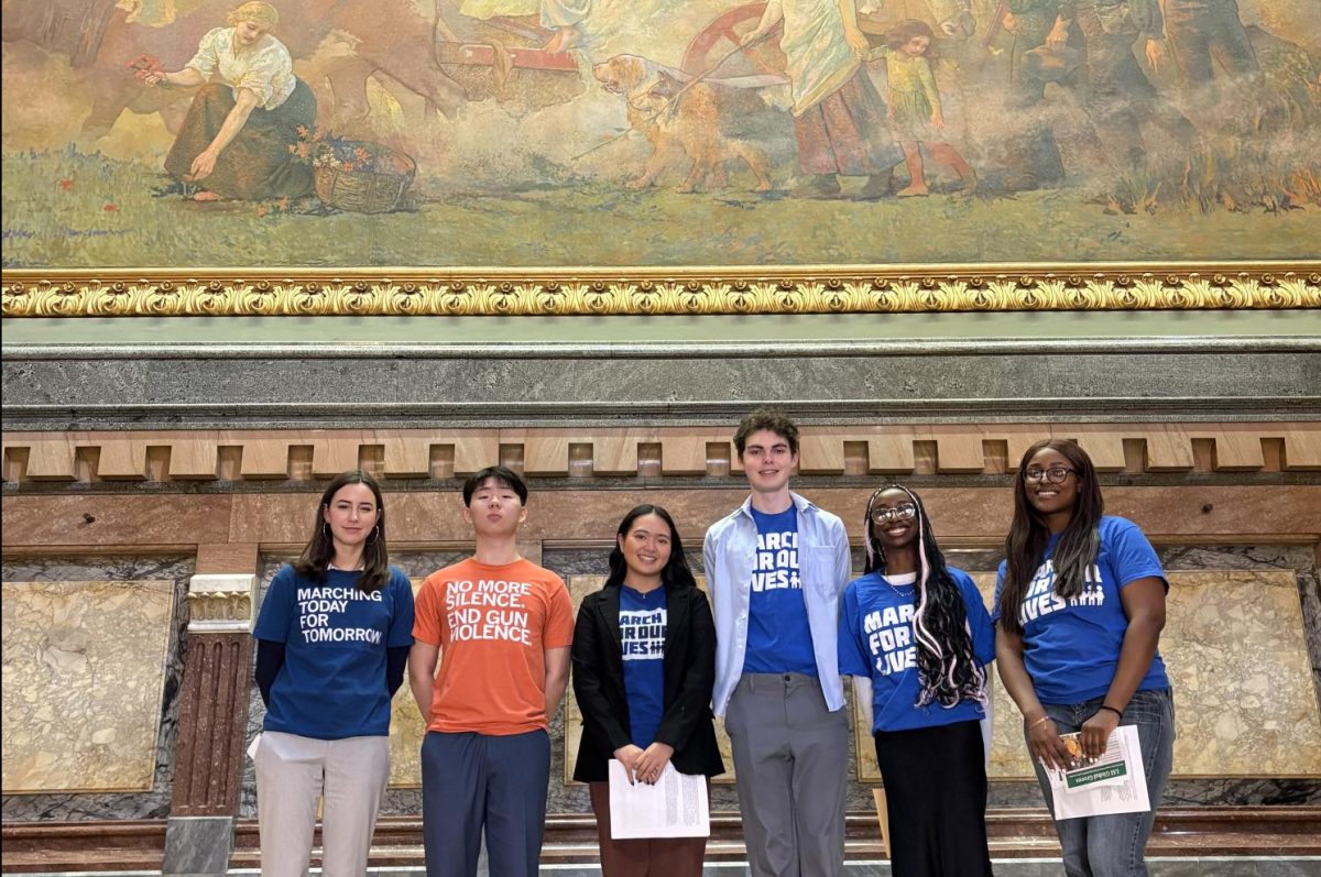 March For Our Lives Students pose for a picture at the Capitol after talking to legislators.