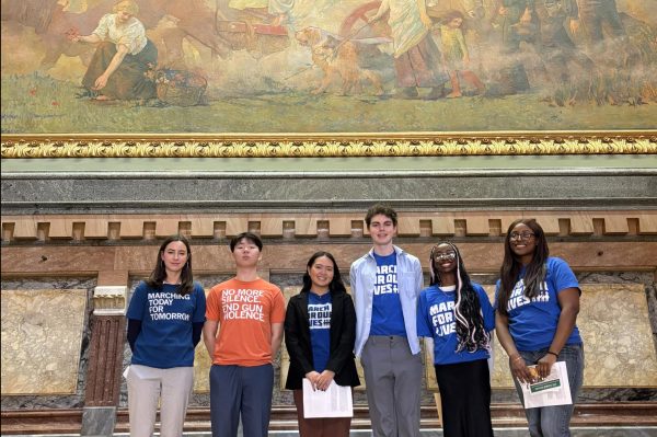 March For Our Lives Students pose for a picture at the Capitol after talking to legislators.