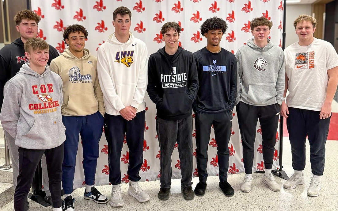 Eight City High students sign their letters of intent to play in colleges. QB Bobby Bacon will travel furtherest from Iowa to Kansas.