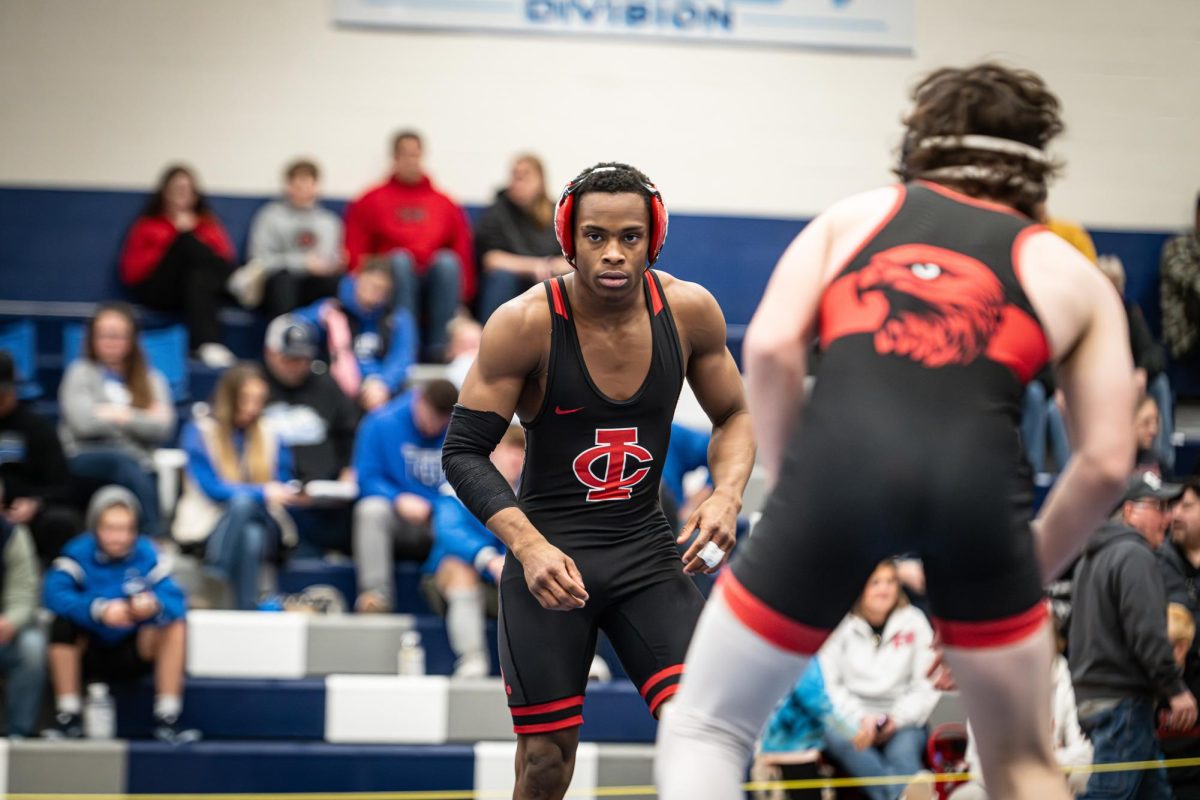 Donovan Gipson '26 wrestles in the second round of his match at districts at Jefferson High School. He went on to win the match.