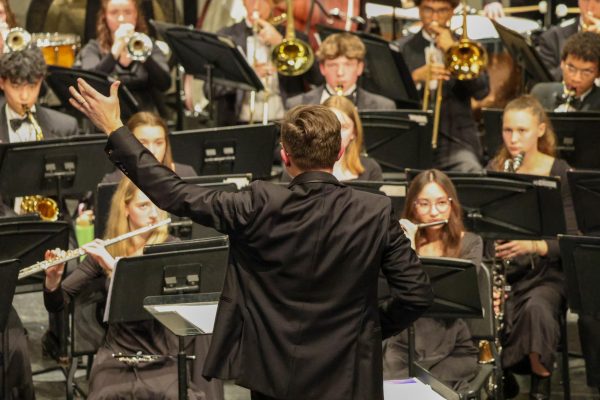 Mr. Kowbel conducts band in Mid-Winter concert